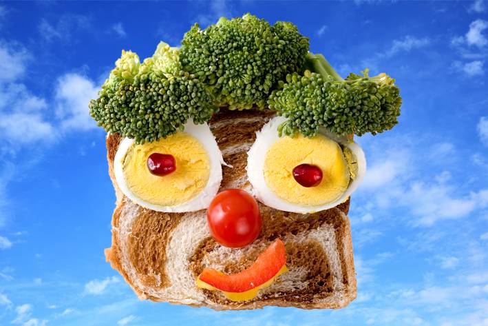 food arranged into a smiling face