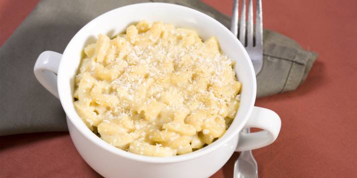 Bowl of Mac and cheese with a fork 