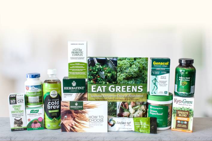 A whole bunch of natural products in green packaging