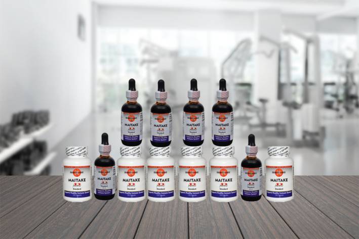 bottles of Mushroom Wisdom's Maitake D-Fraction in liquid and capsule form