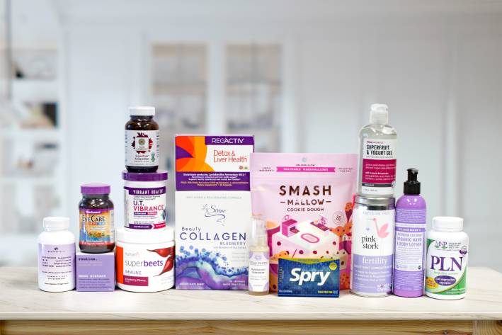 a collection of purple wellness products