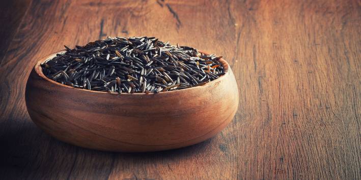 Wild rice in wooden bowl