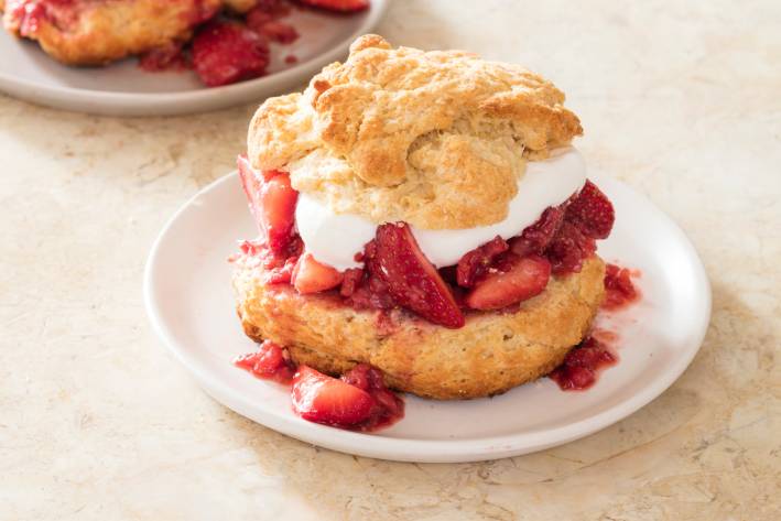 biscuits with strawberries and cream in the middle