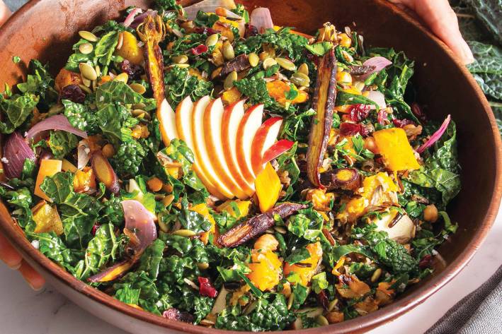 a hearty bowl of salad with seasonal squash and root vegetables