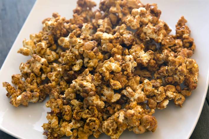 popcorn and nuts coated in caramel
