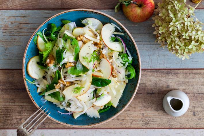 Apple and fennel salad with walnuts and greens. 