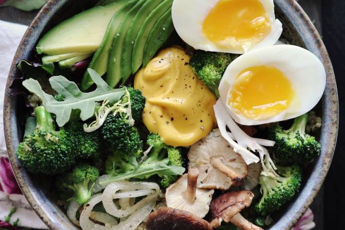 A nutritious power bowl with a dollop of homemade dressing