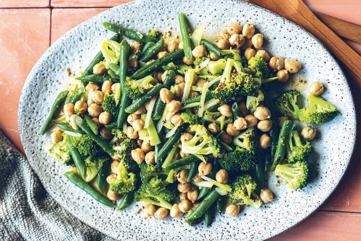 a plate of broccoli, green beans, and chickpeas