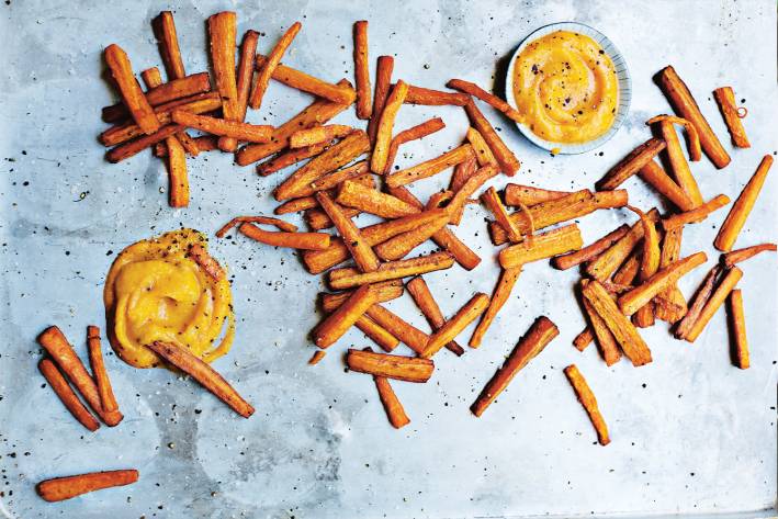 Carrot Fries and Fiery Butternut Squash Ketchup on a metal sheet pan.