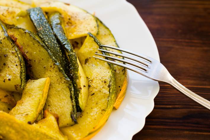 a hot plate of roasted zucchini