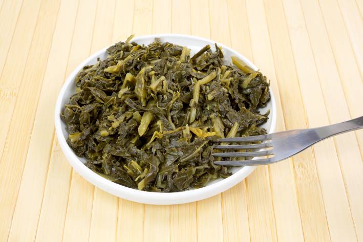 a bowl of collard greens straight from the pan