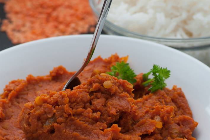 A bowl of fresh homemade red lentil curry