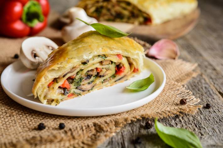a strudel stuffed with vegetables and mushrooms