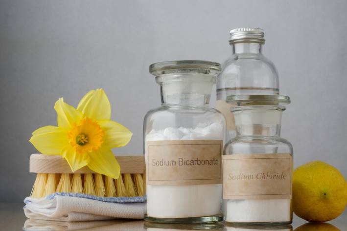 Ingredients to make vatural cleaners in eco-friendly containers