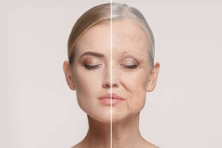 a woman with one half of her face young, and the other is old