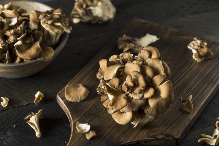dried maitake mushrooms on a cutting board