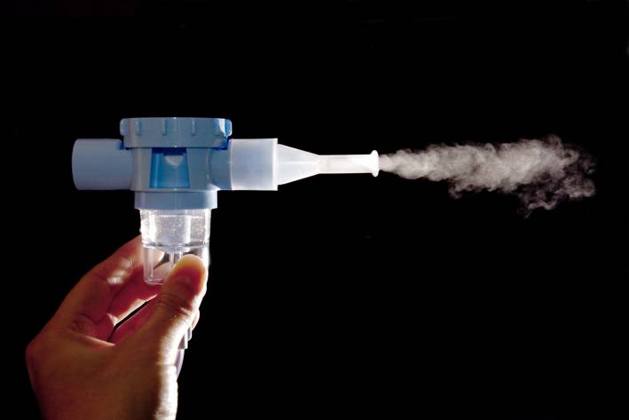 a nebulizer for administering drugs to the lungs