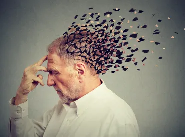 an older man with a scattered mind