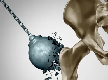 a wrecking ball shattering when it tries to break a hip