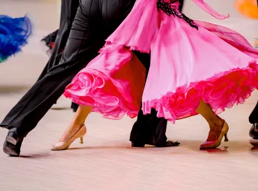 an older couple ballroom dancing