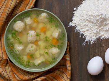 A bowl of chicken soup with home-made dumplings