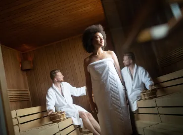 a man and a woman in a sauna