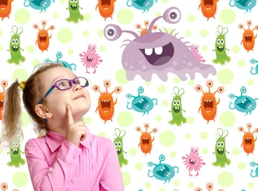 A little girl looking at some friendly "good" bacteria