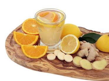 a vitamin health tonic with oranges
