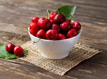 a bowl of fresh cherries