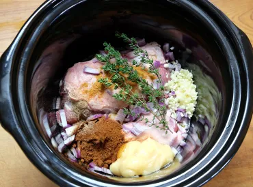 Ingredients for pulled pork slow cooker or crockpot meal ready for cooking.