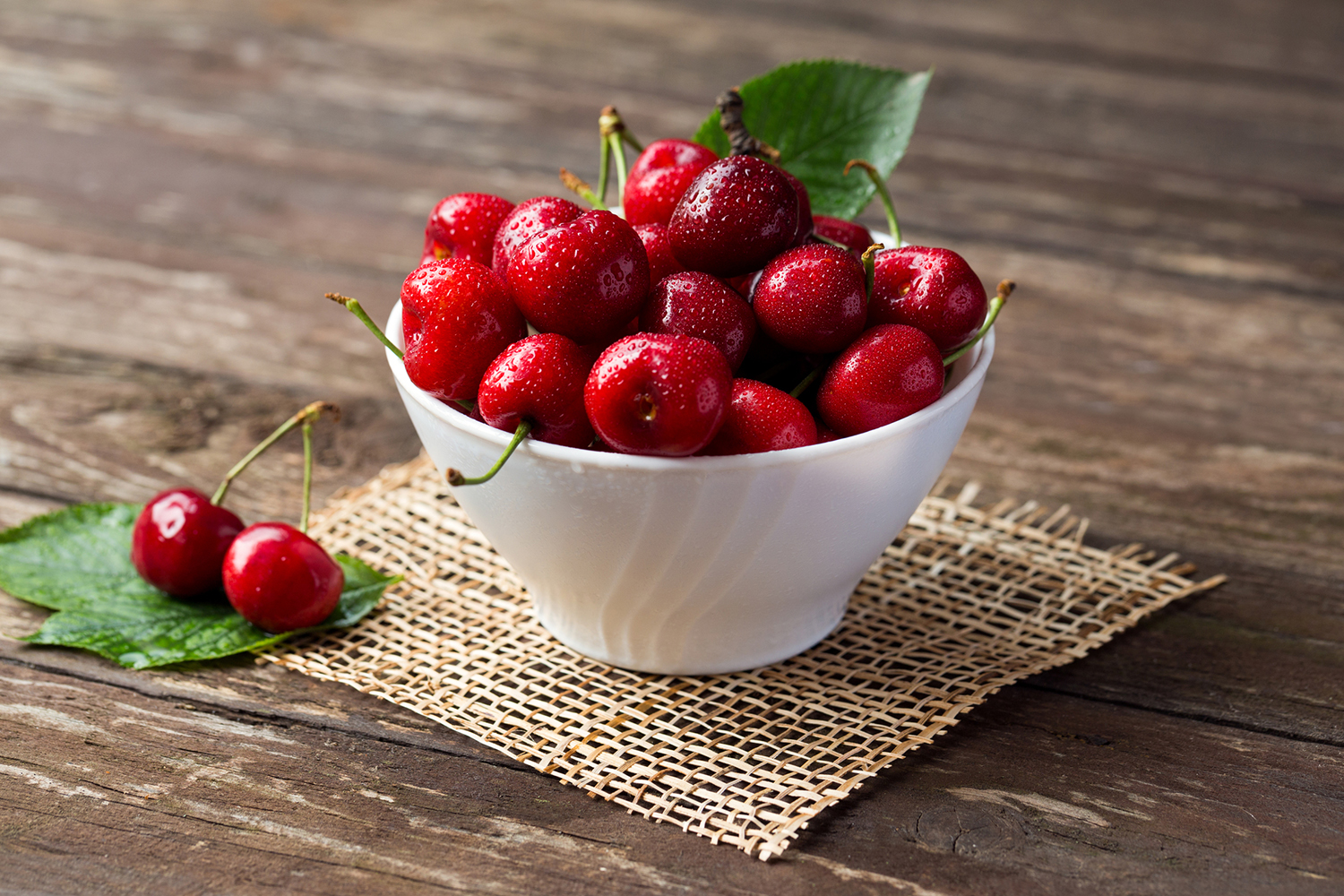 a bowl of fresh cherries